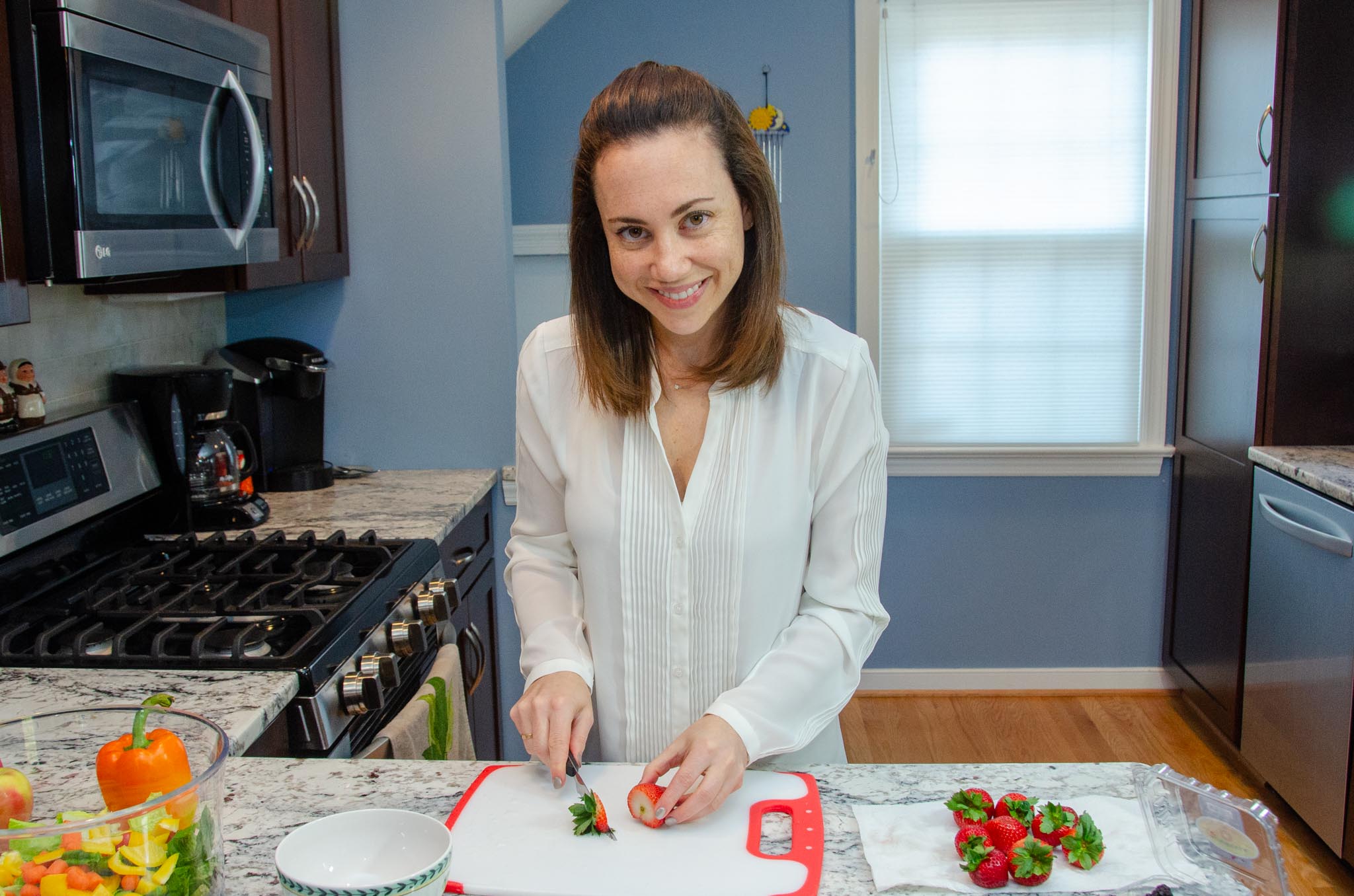 Woman preparing food at a kitchen counter