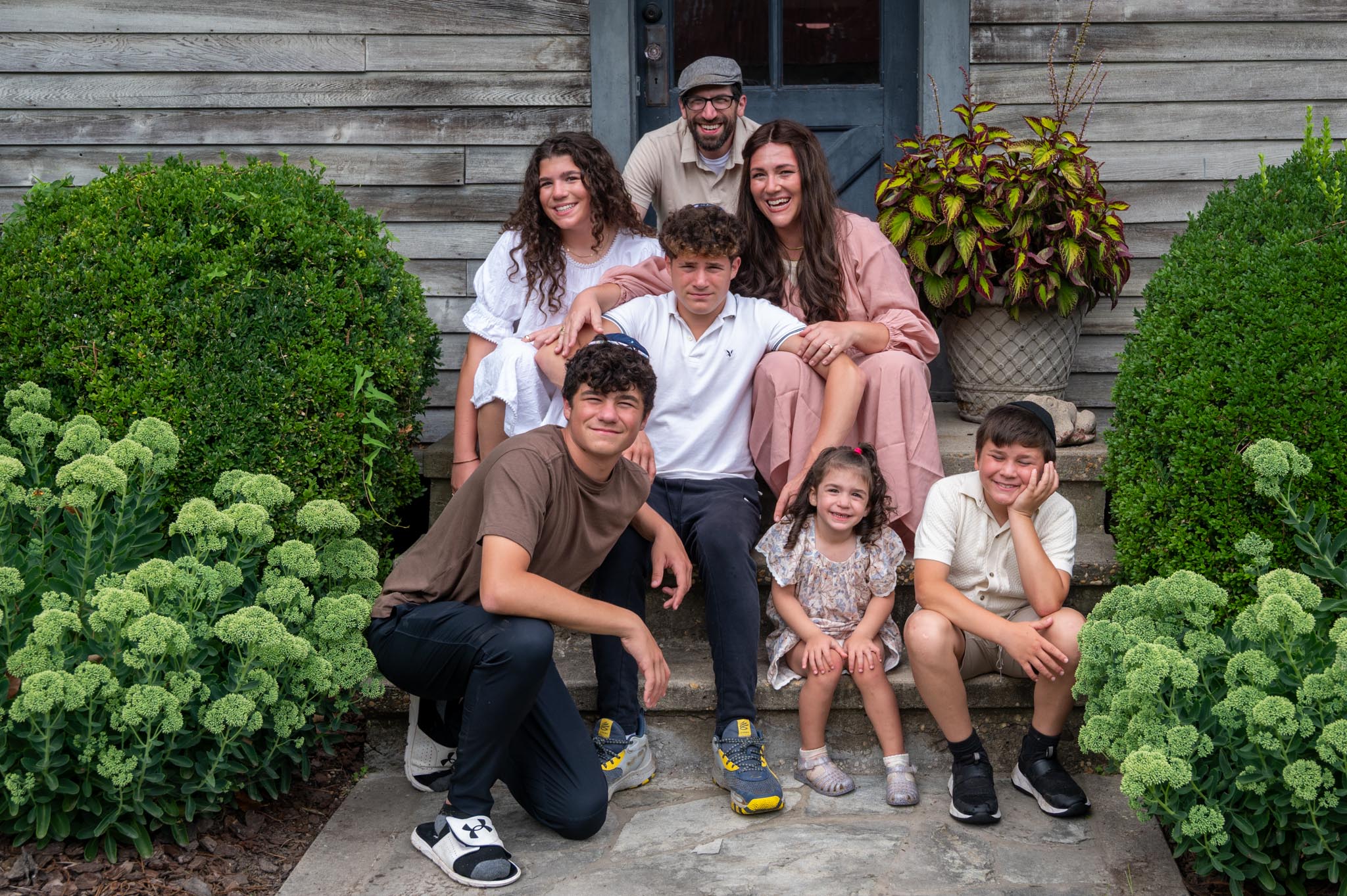 Family gathered on garden steps